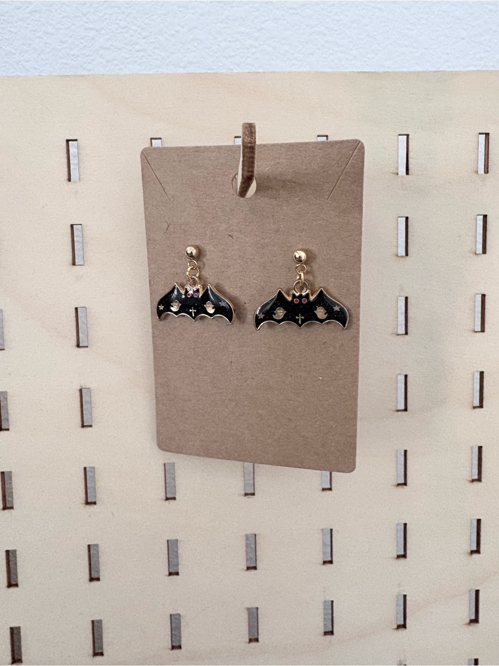 Handcrafted vampire bat charms dangle earrings